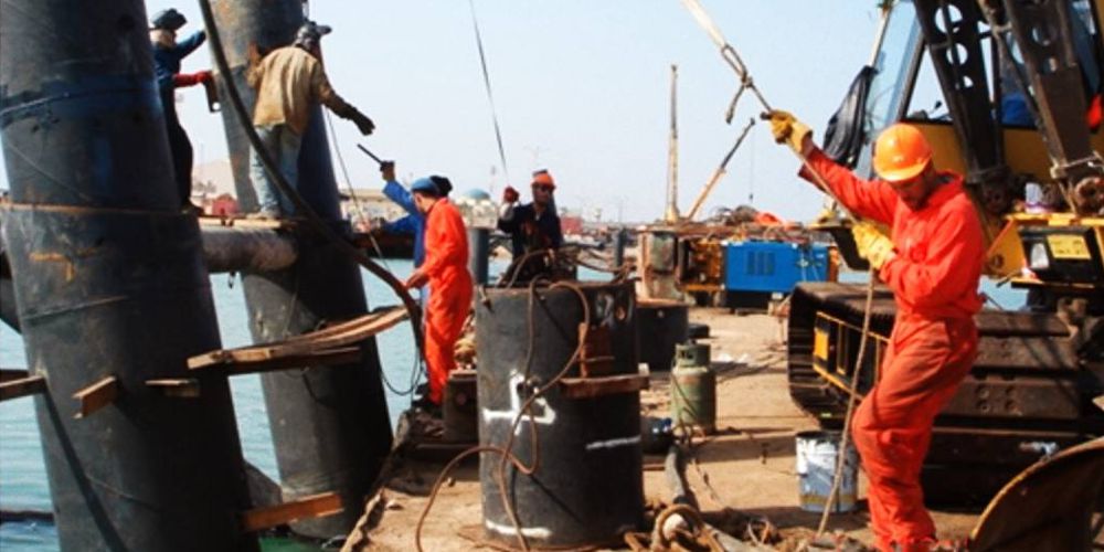 Onshore inclined steel pipes piles works at Umm Qaser ports